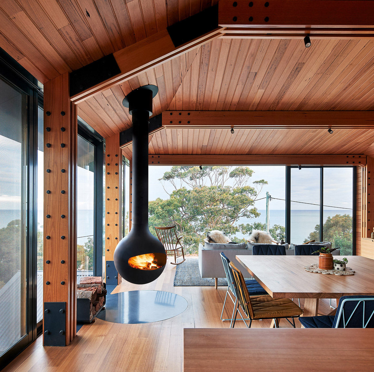 Focus Bathyscafocus spherical suspended fireplace, a black steel orb pivoting on a single column