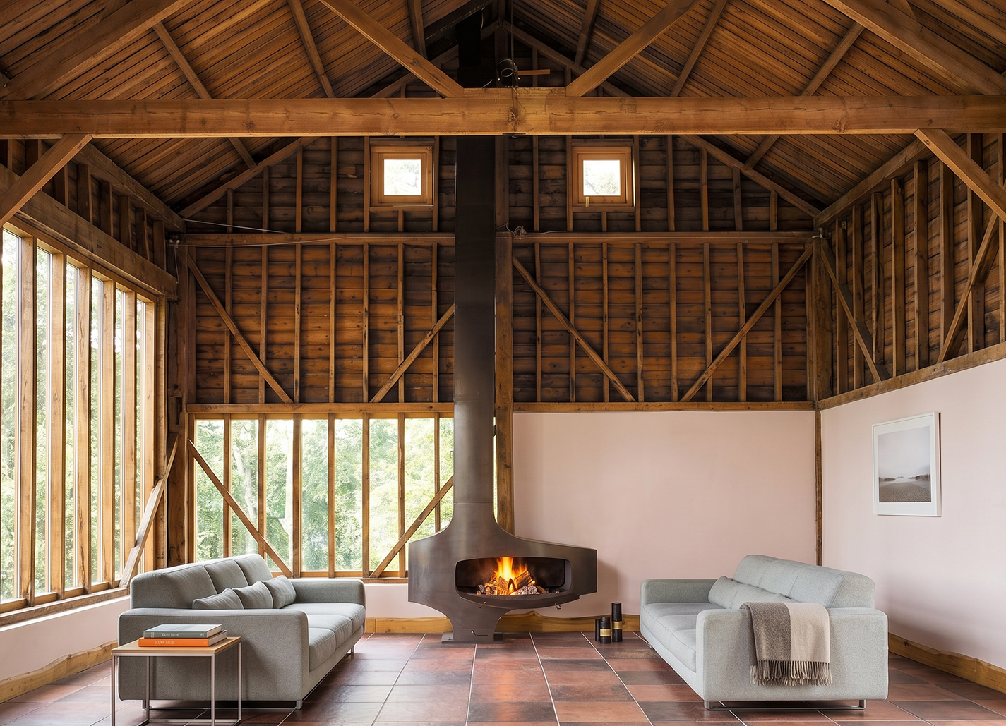 Focus Heterofocus free-standing wood-burning fireplace, a tall geometric steel form with marked angles and visible welds