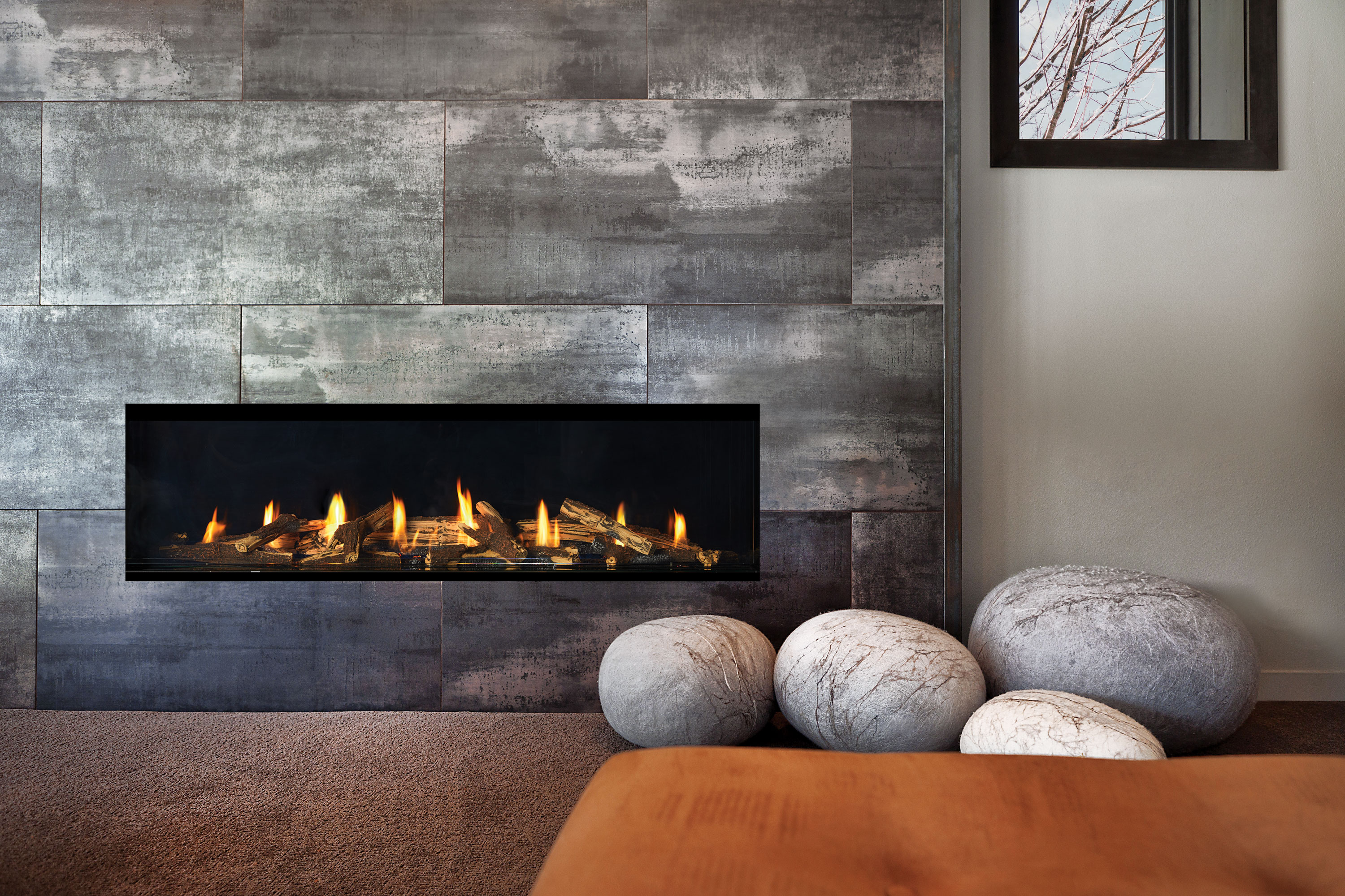 Regency New York View CV60E single-sided linear gas fireplace, a wide horizontal ribbon of flame set into a clean modern feature wall
