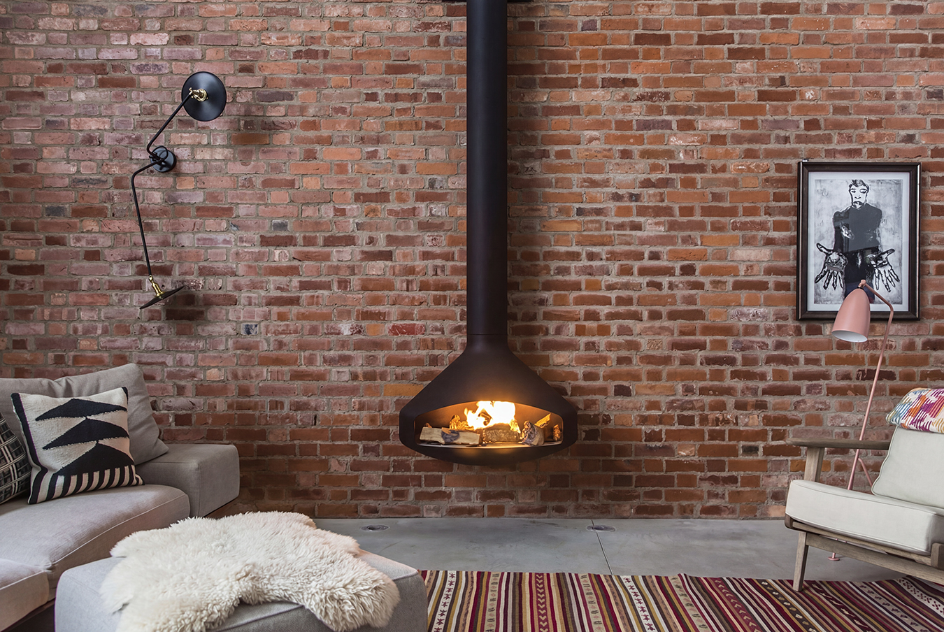 Focus Paxfocus wall-mounted angular steel fireplace, a sibling of the Ergofocus shaped to sit against a wall