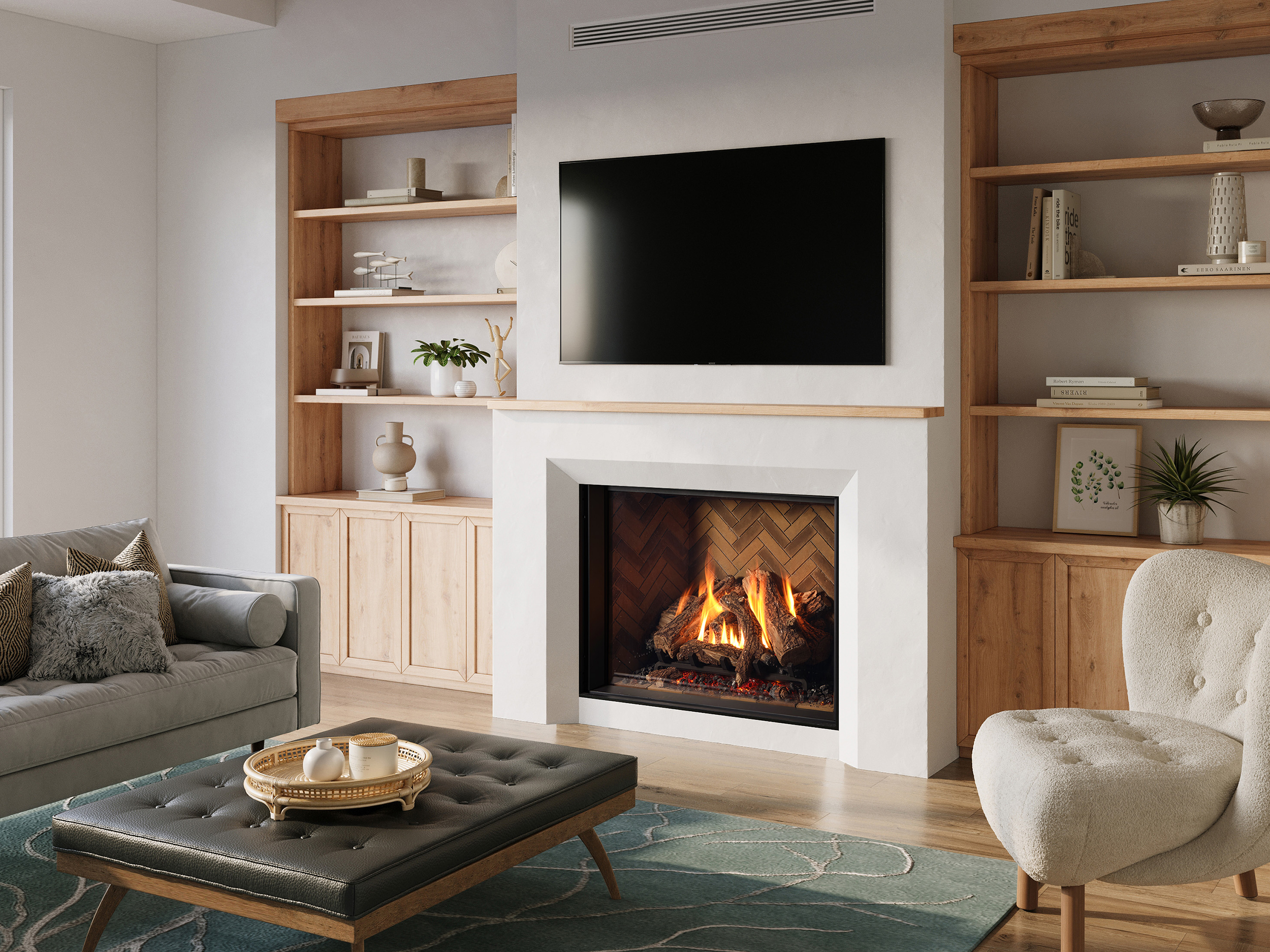 Regency Grandview G1200 gas fireplace with a herringbone-brick interior and a large log fire, a television mounted on the cool wall directly above it between built-in shelving
