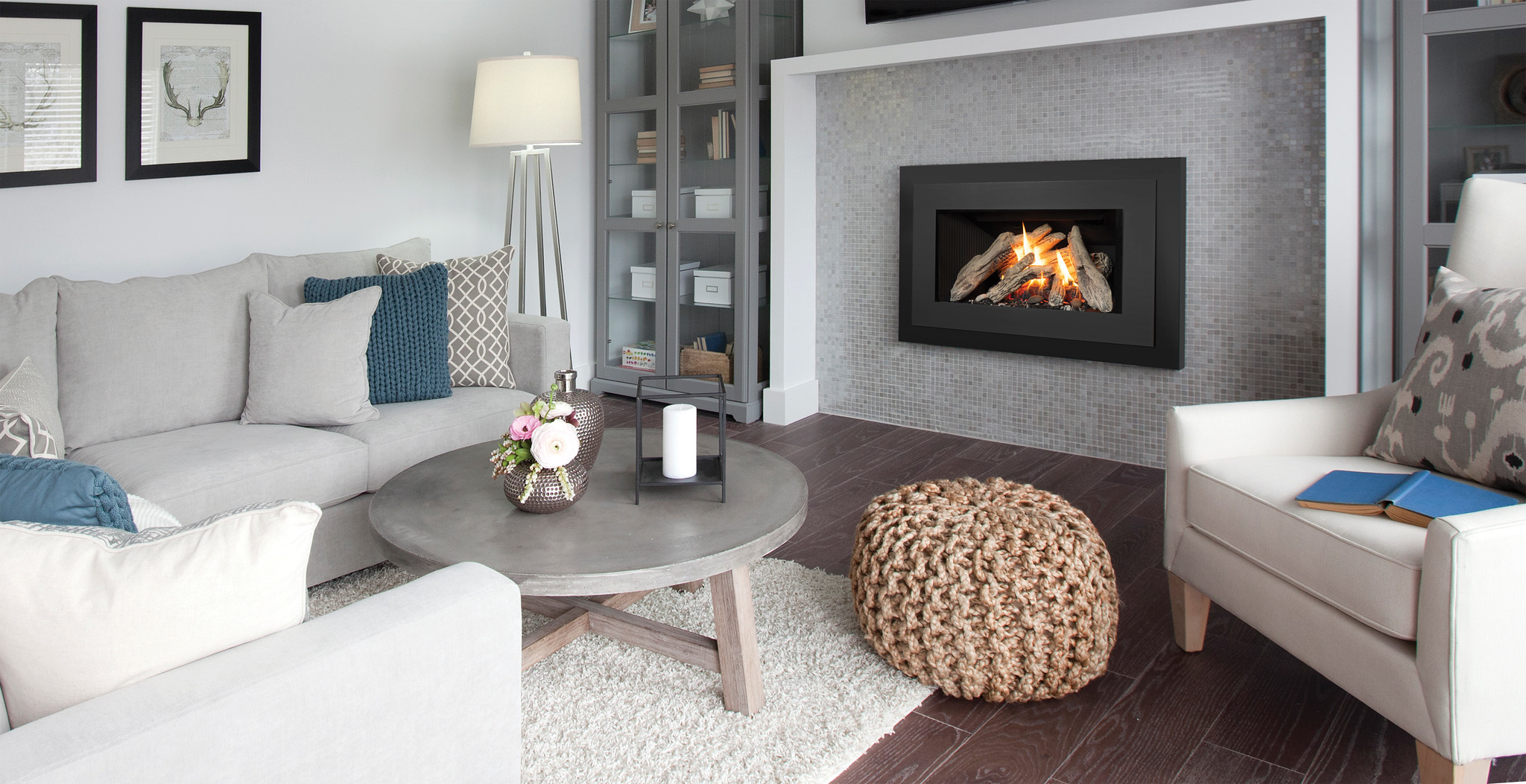 Valor G3 V-Class gas insert with a black trim front set into a grey mosaic-tile surround in a bright, contemporary living room