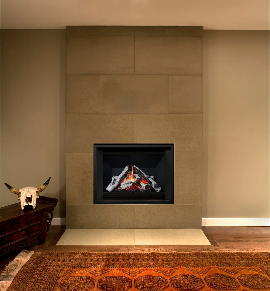 Valor H3 fireplace with Clean Install trim in a heritage-style interior with stone surround